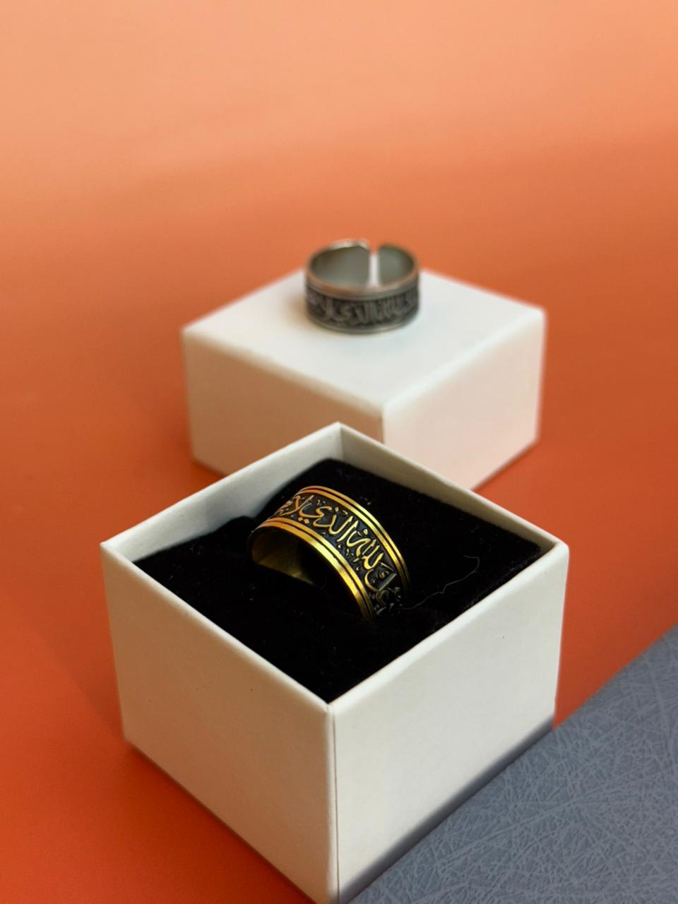 A ring with a religious phrase and laser engraving on the inside